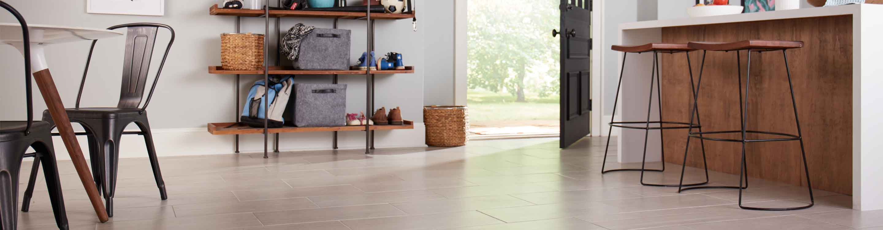 modern kitchen with wood look tile flooring, wooden shelving, kitchen table, counter and wood barstools